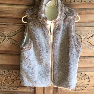 Reversible faux fur/quilted zippered vest